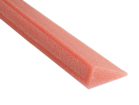 Roof valley sealing wedge