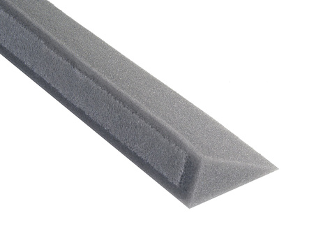 Roof valley sealing wedge