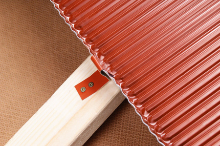 Roof valley flashing pressed across